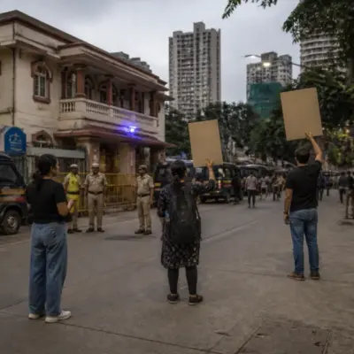 Mumbai protest detentions near a police station after a Carter Road solidarity walk was halted