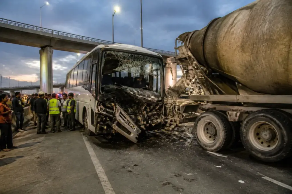 Emergency response after a Batasingaram flyover accident involving a bus and cement lorry