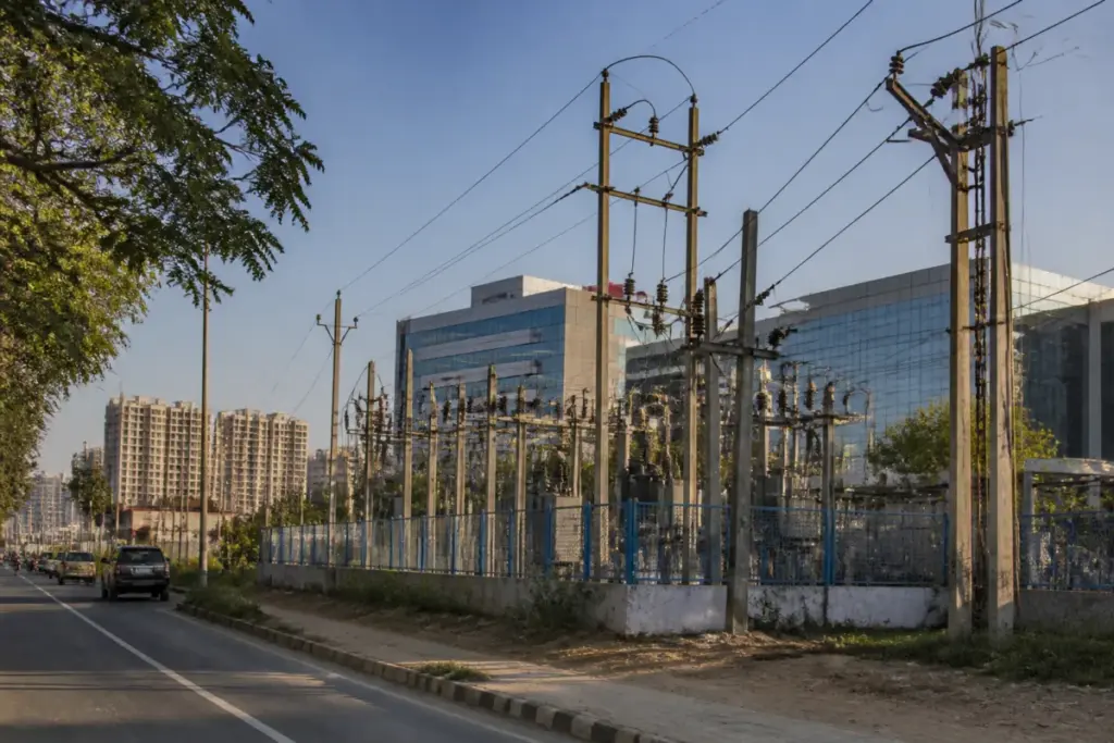 Gurugram power distribution network with urban power lines and commercial buildings