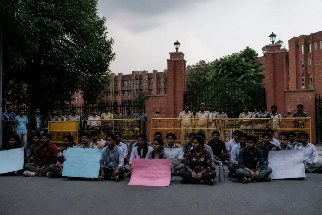Delhi university protests outside a campus gate during a student hunger strike