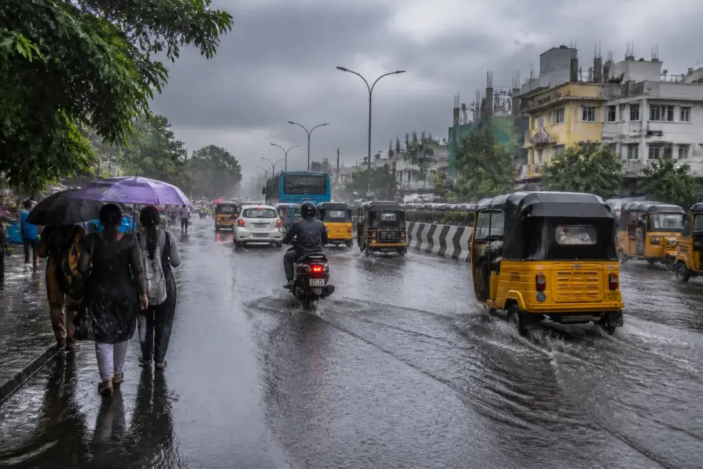 Tamil Nadu rain alert over a waterlogged urban road during heavy monsoon rain