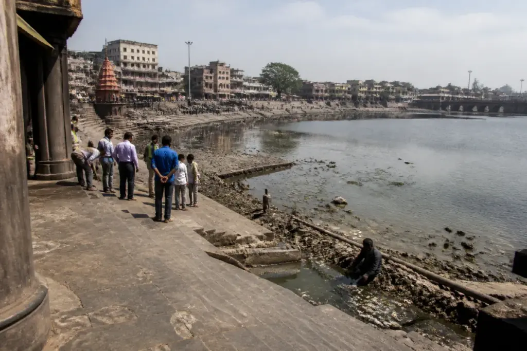 Nashik Kumbh Mela water sites at Ramkund on the Godavari amid low river levels and civic works