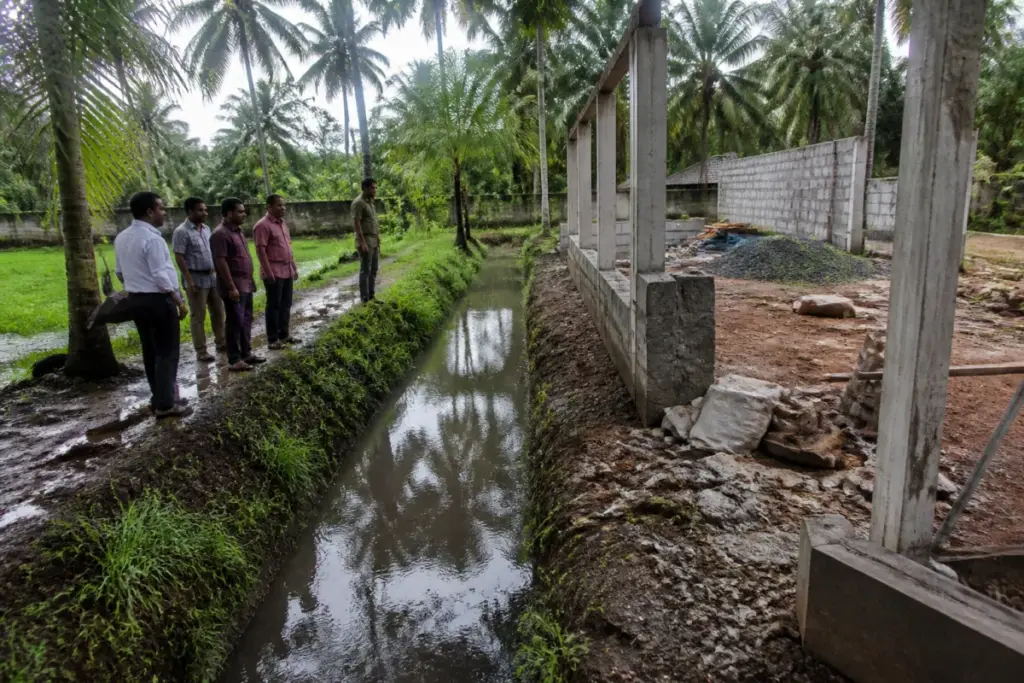 Koorachithodu encroachment site beside a traditional drainage channel in Ernakulam