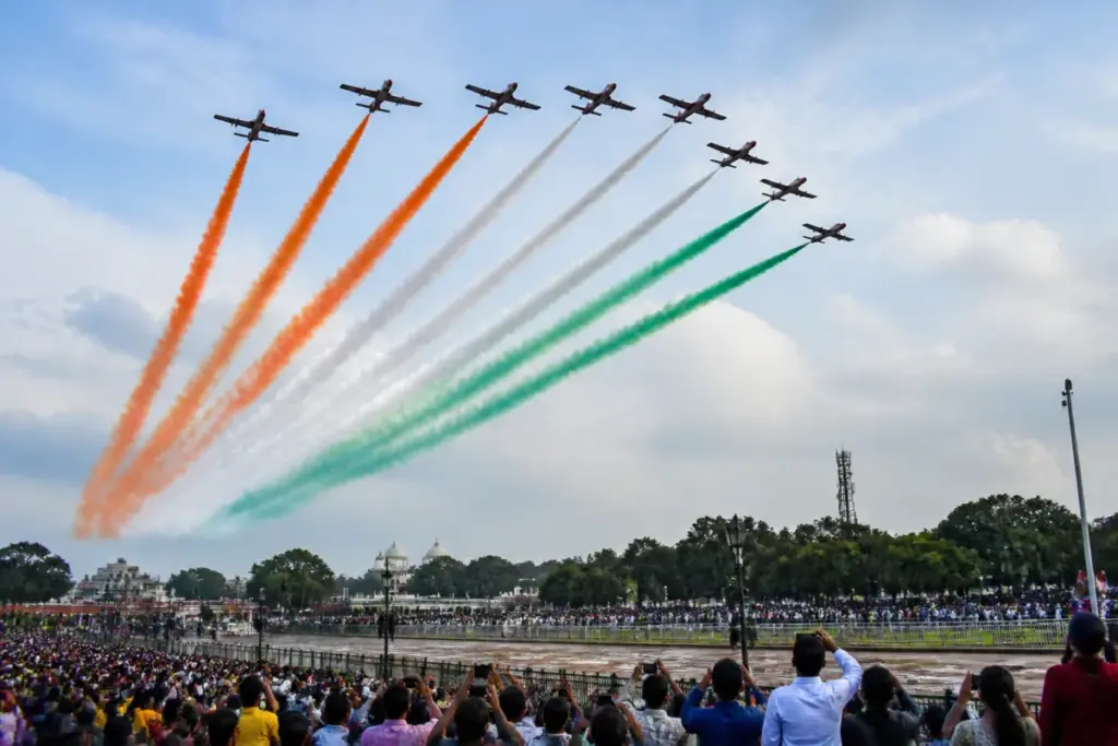 Mysuru air show with Surya Kiran aircraft forming patterns above Bannimantap