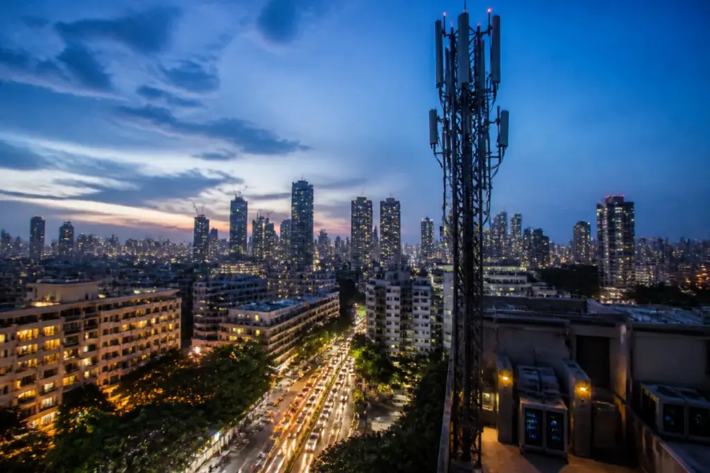 Jio IPO and digital infrastructure represented by a modern 5G network in an Indian city