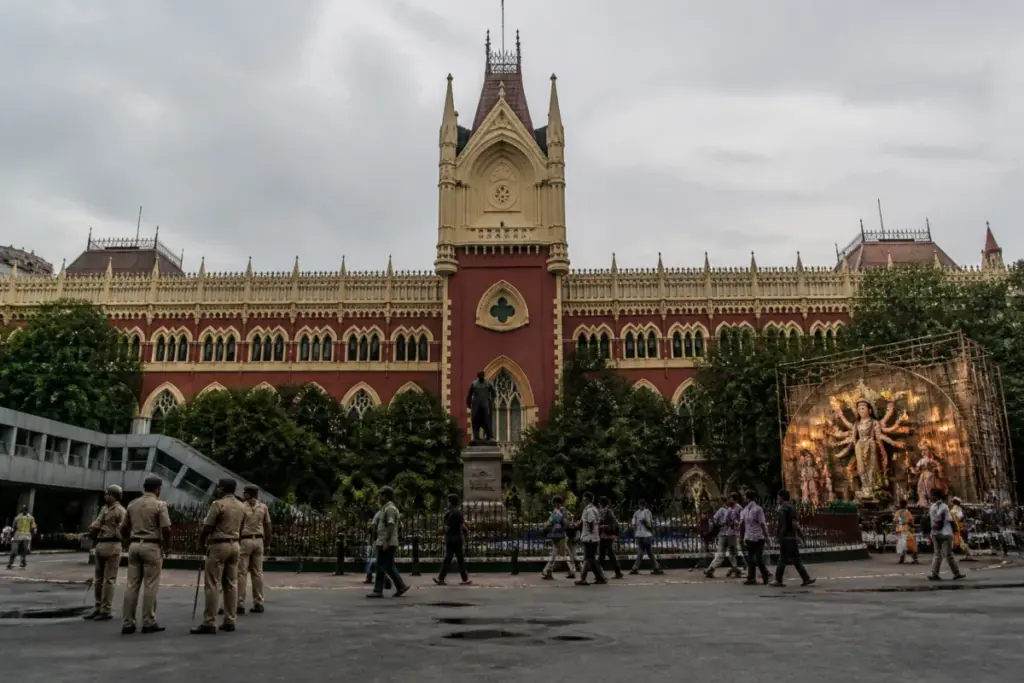 Kolkata stampede inquiry outside the Calcutta High Court during Durga Puja