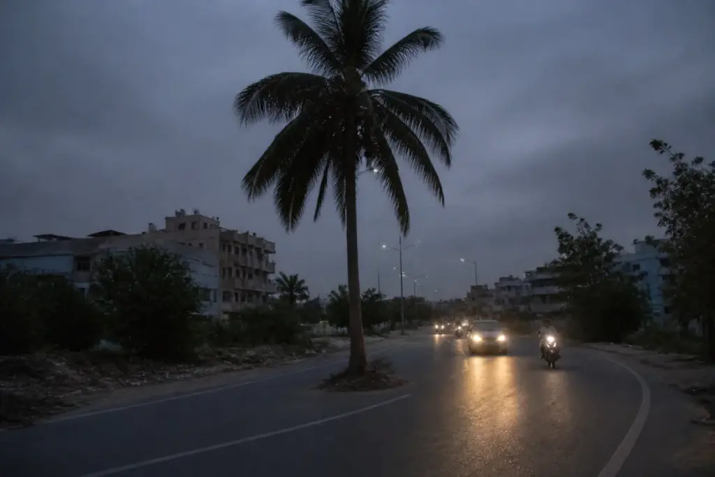 Tree obstructing a newly built road on Ahmedabad’s Ramol Road, raising road safety concerns.