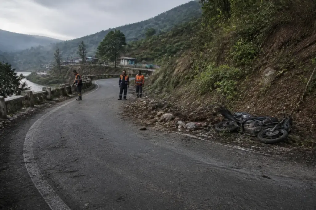Jawhar ashram school crash scene near a rural river ghat in Palghar