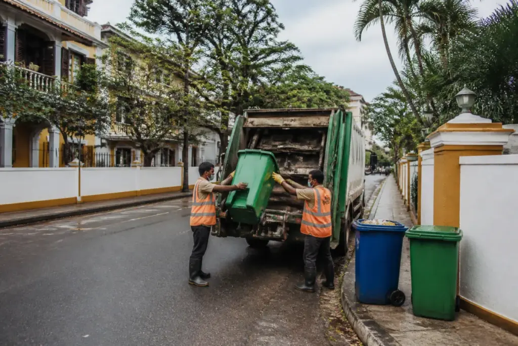 Panaji garbage collection contract services operating on a city street in Goa