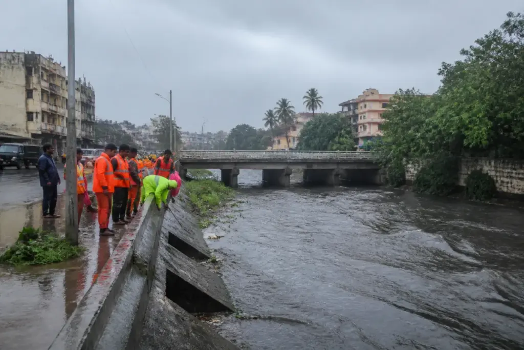 Chennai flood preparedness concerns near a waterway during monsoon rain