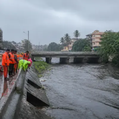 Chennai flood preparedness concerns near a waterway during monsoon rain
