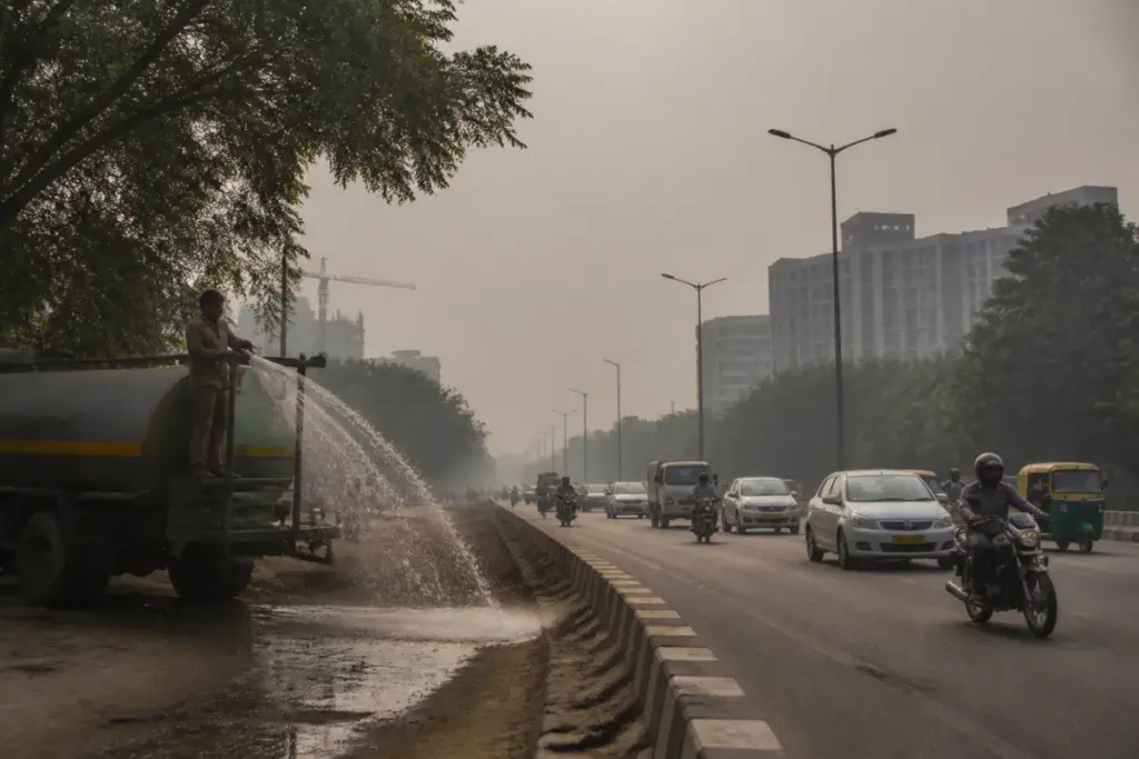 GRAP 1 Delhi air pollution measures on a hazy urban road