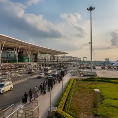 Chennai airport terminal and aircraft reflecting the airport privatisation debate