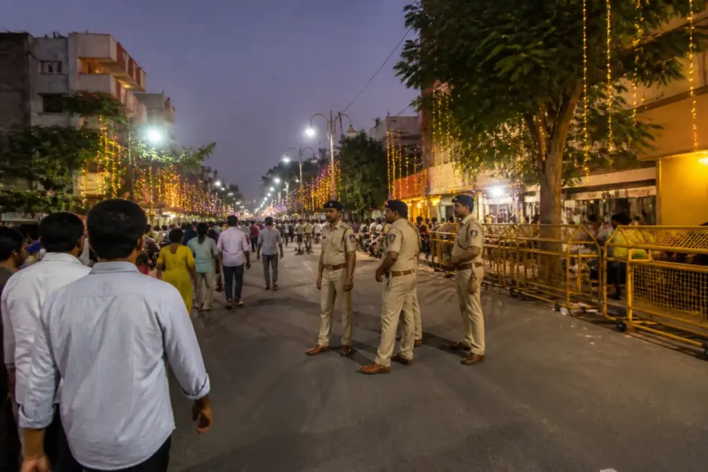 Baramati noise pollution rules displayed near a festival area with police monitoring public celebrations