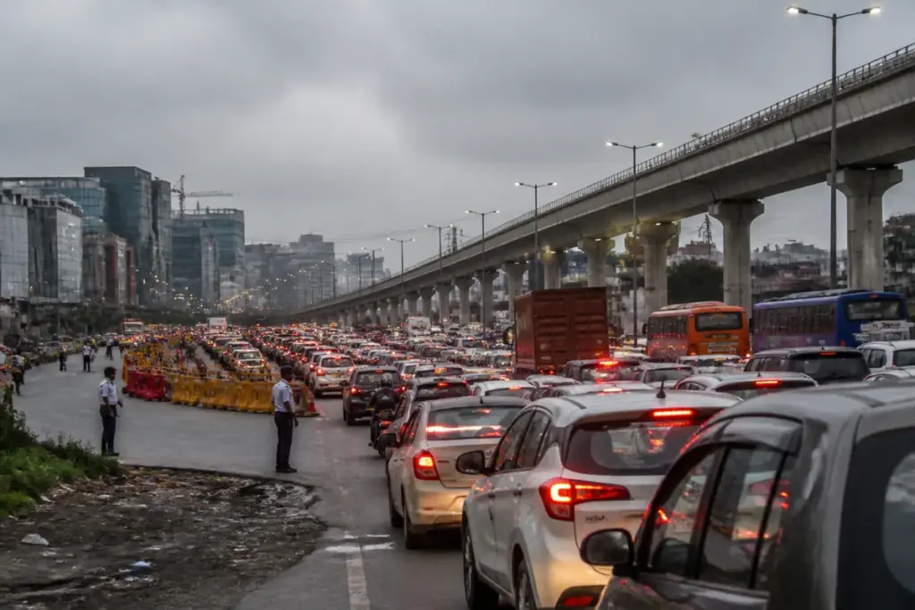 Gurugram traffic jam on NH-48 with vehicles queueing towards Delhi
