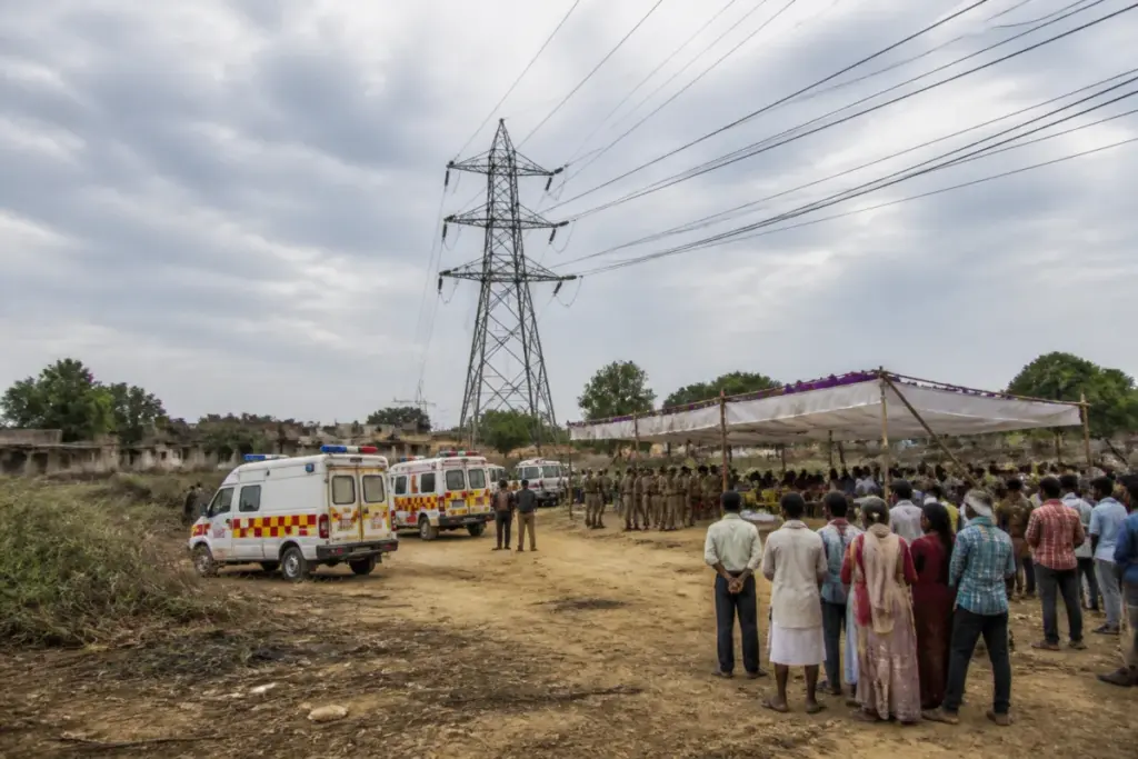 Emergency response near a tent and overhead power lines after the Pratapgarh electrocution incident.