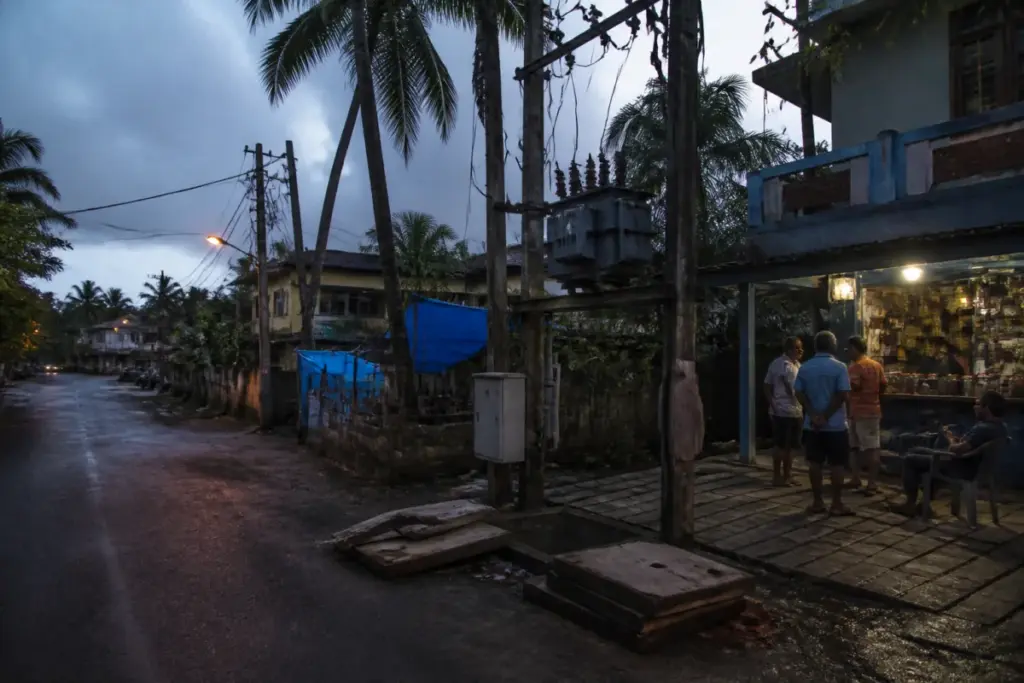 Benaulim power outages affecting a Goa coastal village with electricity infrastructure in the background