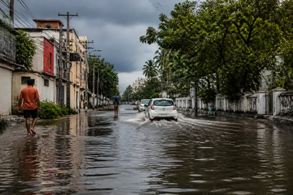 Puducherry heavy rains flooding a low-lying urban road