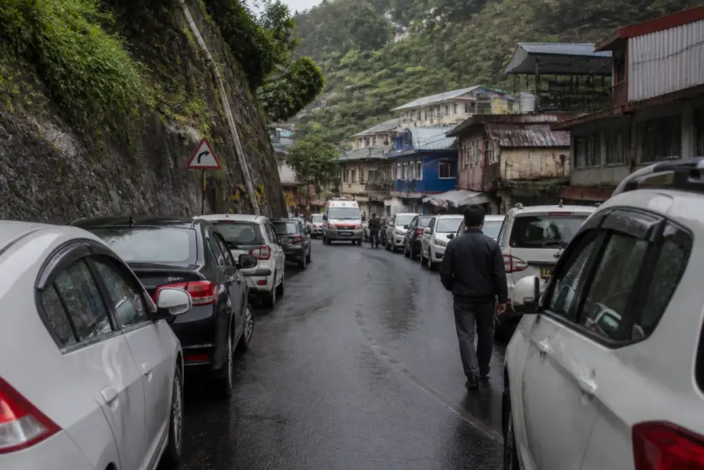 Nilgiris ghat road parking narrowing a busy hill road near Coonoor