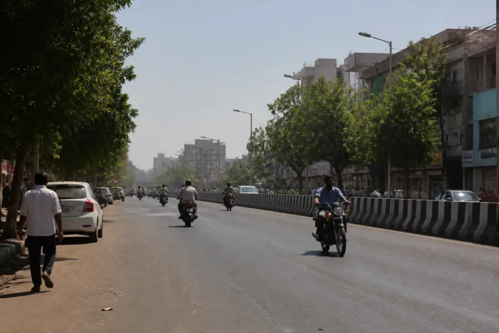 Gujarat weather forecast showing a hot, dry urban street in Rajkot