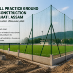 Football practice ground under construction with boundary safety nets at a sports complex in Guwahati