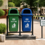 ISI marked dust bins installed in an outdoor public space in Jalgaon Maharashtra representing government sanitation infrastructure